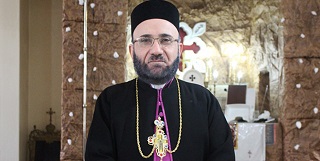 Aramäischer Priester: Hand in Hand gegen türkische Drohungen 